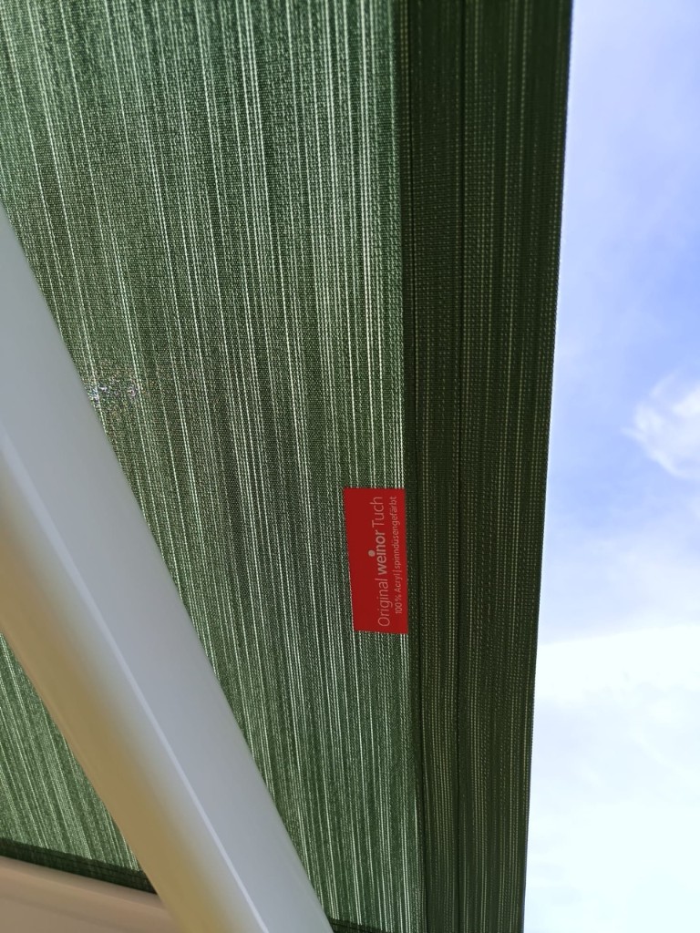 Close-up of Weinor Cassita II awning bracket mounted on brickwork in Loose, Kent