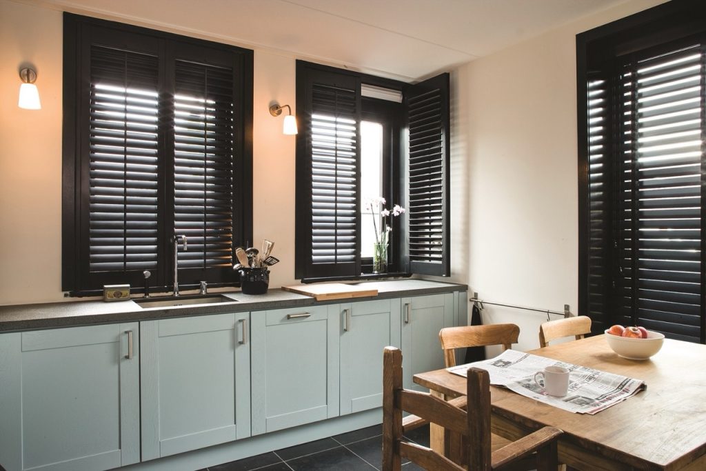 Full-height shutters installed in a modern Kent home