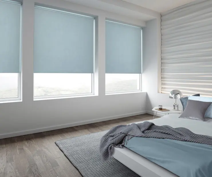 Roller blinds installed in a glazed Kent room