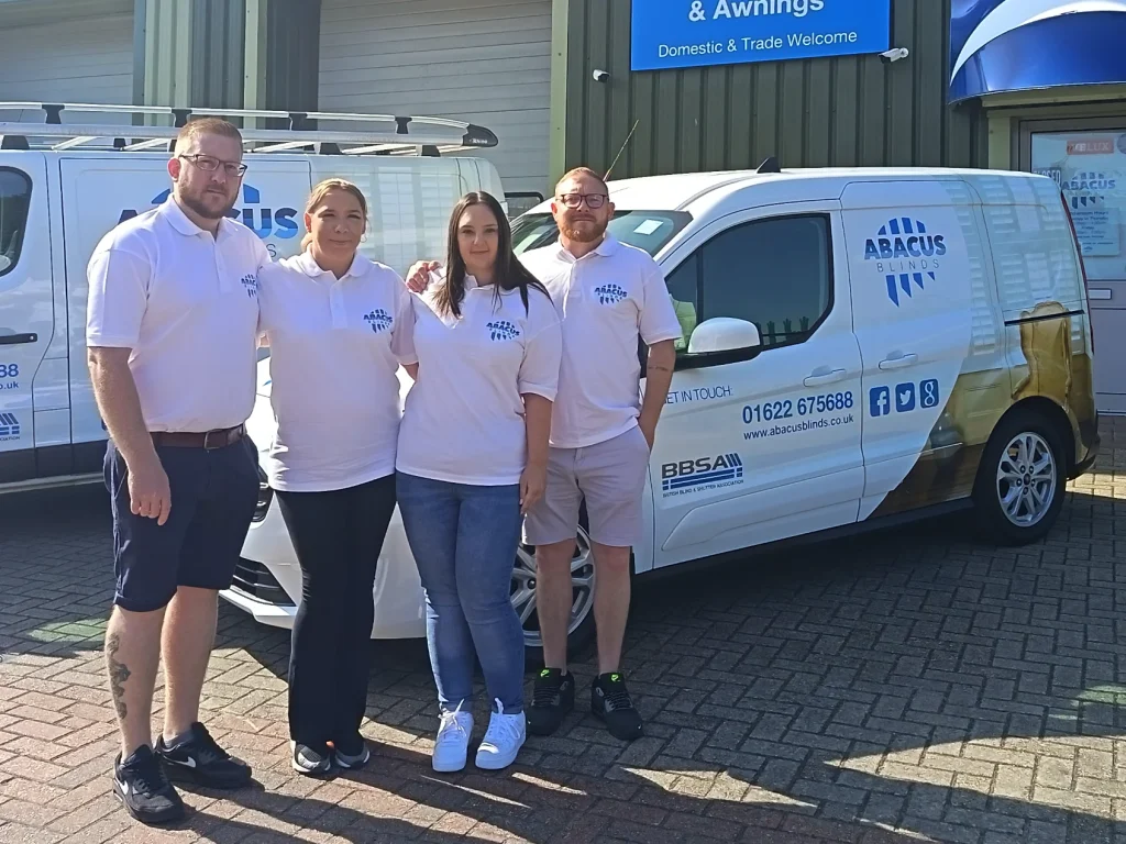 The family-run Abacus Blinds team in front of their branded vans at the Maidstone showroom in Kent